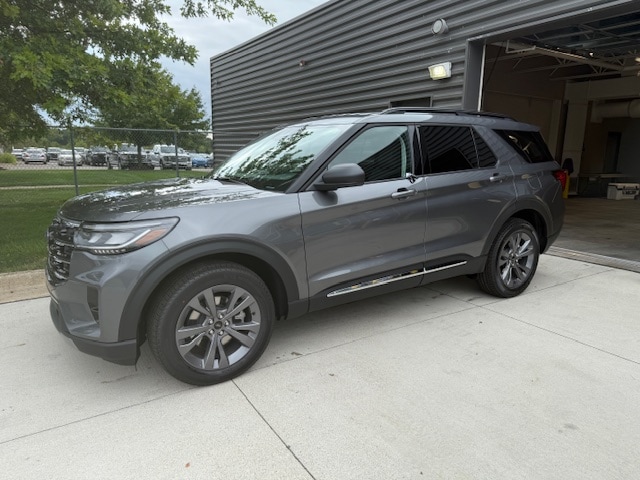 2025 Ford Explorer Active in Carbonized Gray parked outside Friendly Ford